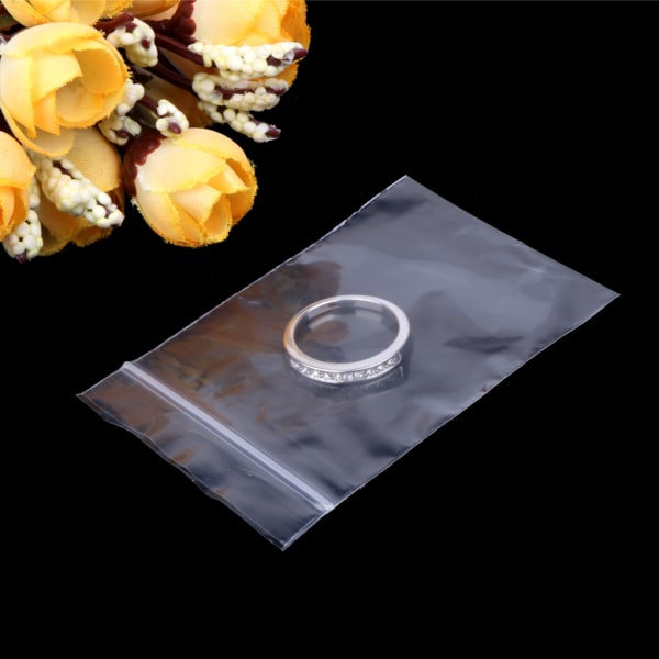 100 st/förpackning Liten zip lock Återförslutningsbar genomskinlig påse Örhängepåse Vakuumgenomskinlig påse Tjocklek Slitstark szq