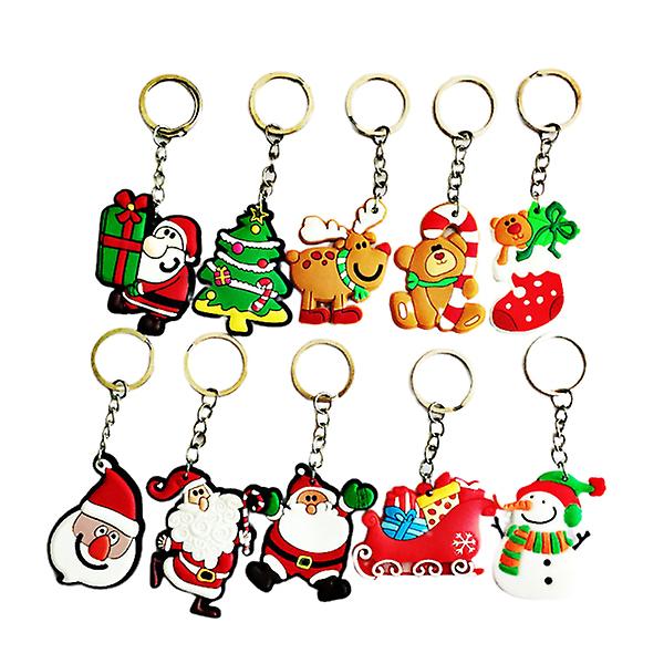 12 st Nyckelringar med jultema tecknat mönster jultomtens hänge Nyckelringar Festfavoriter (slumpmässigt mönster)
