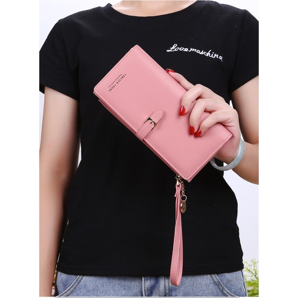 Kvinnors hand som håller lång plånbok mobiltelefonväska - gul