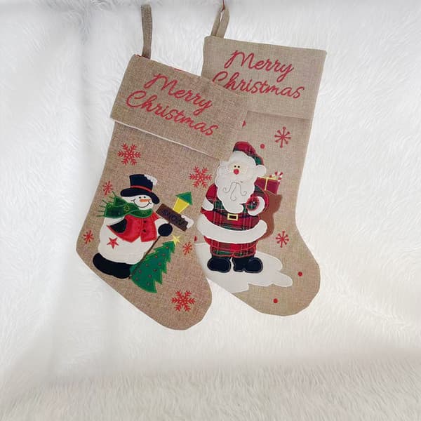 2 par julstrumpor presentpåsar linne broderad tomte