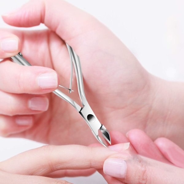 Nagelbandssax med nagelbandspusher, nagelbandsskärare, skär