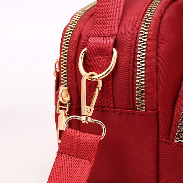 Kvinders triple lynlås lærred crossbody taske blue