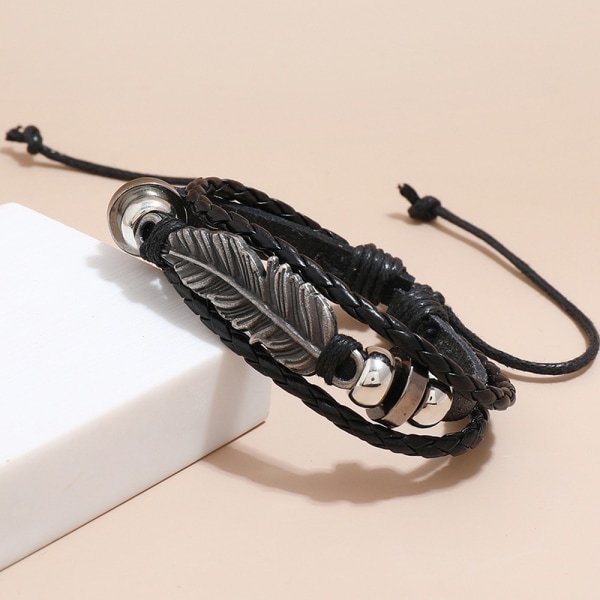 Populära modeaccessoarer enkla legering fjäderpärlor läderarmband