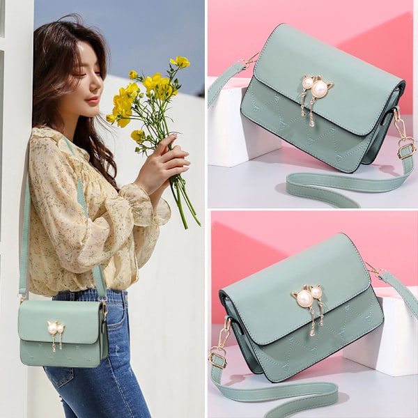 Muodikkaan kissanpään muotoinen crossbody-olkalaukku