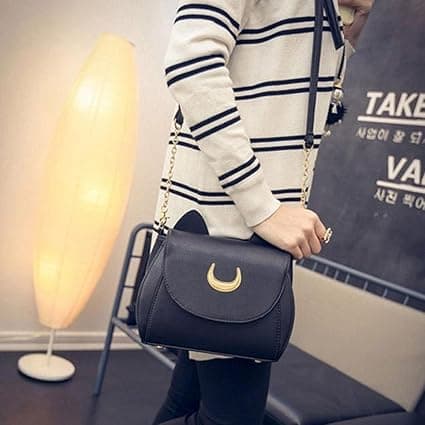 Crossbody-väska, utsmyckad med vacker månöredesign