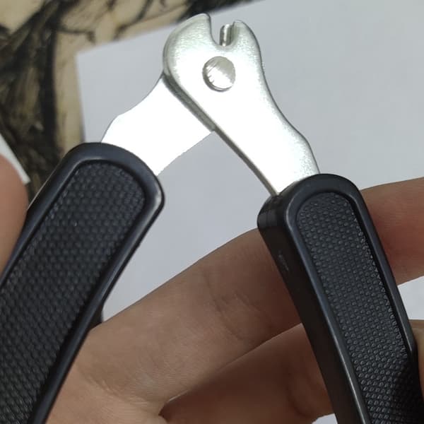 Gitarstrengsbytter i tre