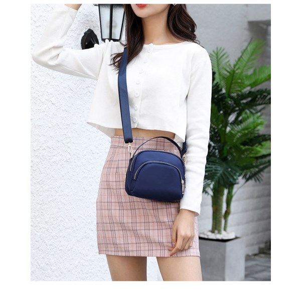 Kvinners trippel glidelås lerret crossbody veske purple