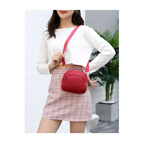 Damtrippel blixtlås canvas crossbody väska light gray