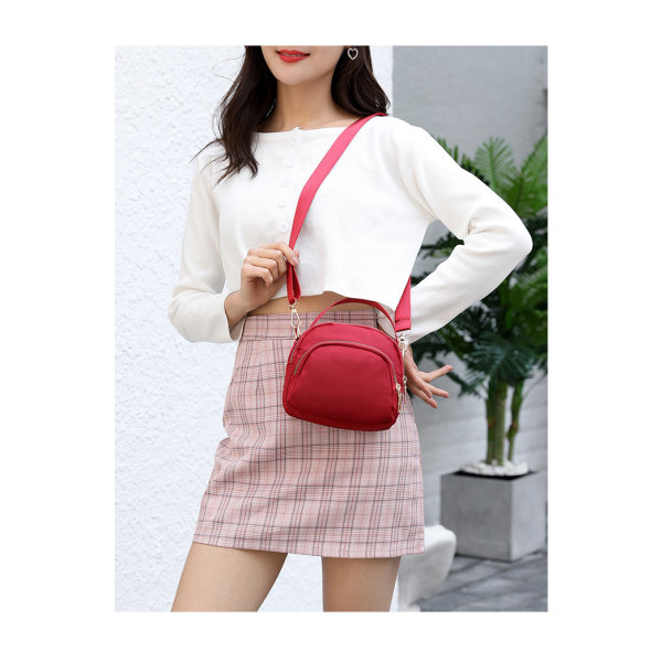 Kvinners trippel glidelås lerret crossbody veske purple