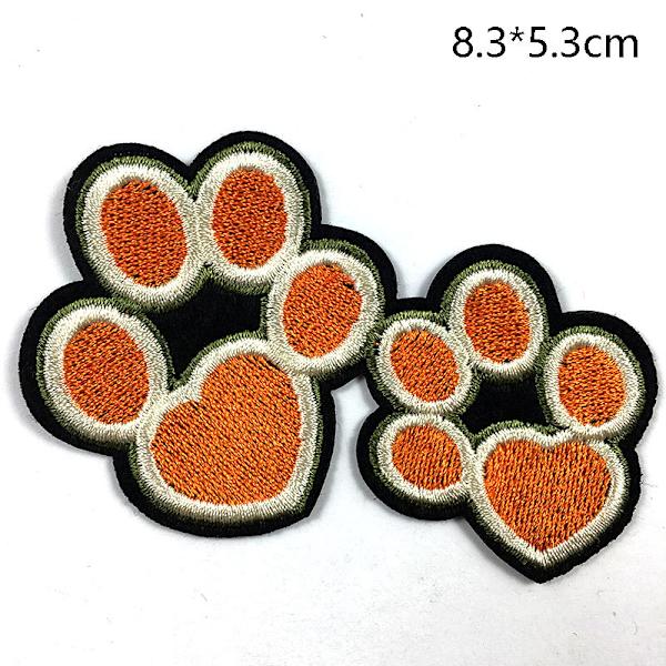 9 stk. broderte lapper med hundepotesymbol - strykemerker for DIY-broderi