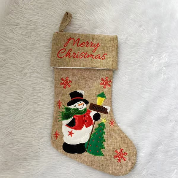 2 par julstrumpor presentpåsar linne broderad tomte