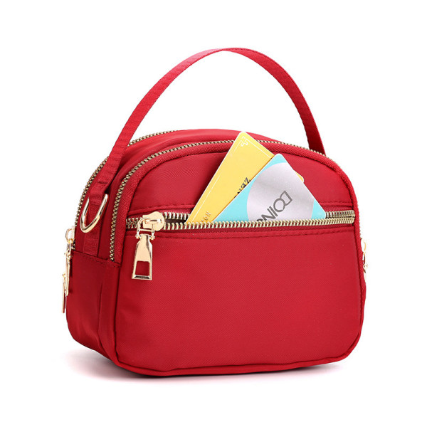 Damtrippel blixtlås canvas crossbody väska blue