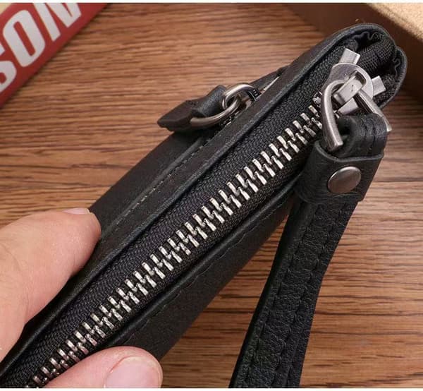 Herre clutch i topnarvet læder