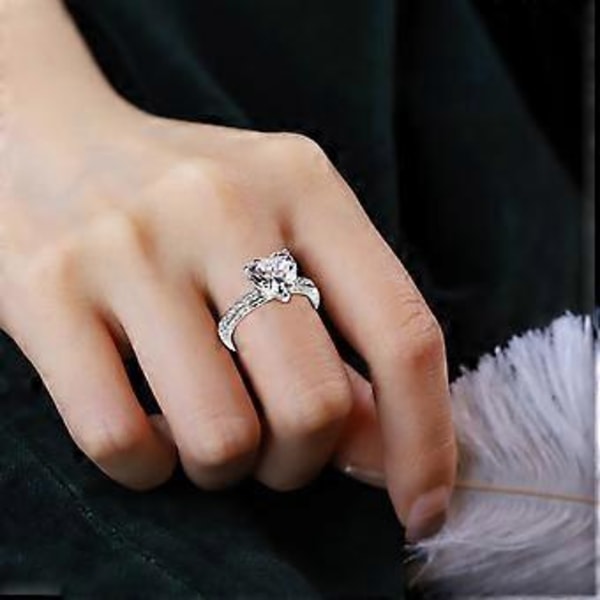 Ny vigselring inlagd med hjärtformad diamant zirkonring för kvinnors förlovningssmycken