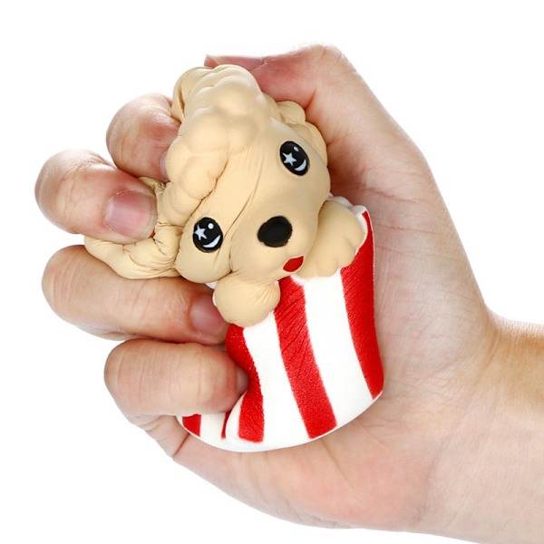 Popcorn hund stressboll (ca 12cm hög), långsamt stigande och