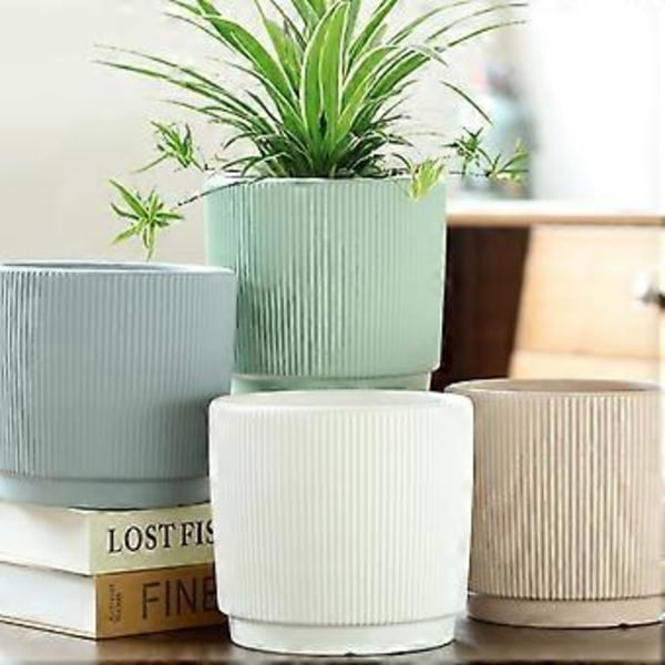 Plantepotte Keramisk plantekrukke med bakke med indbygget cylindrisk design Højde 11,5 cm Slidsede ribbede design Plantekrukke