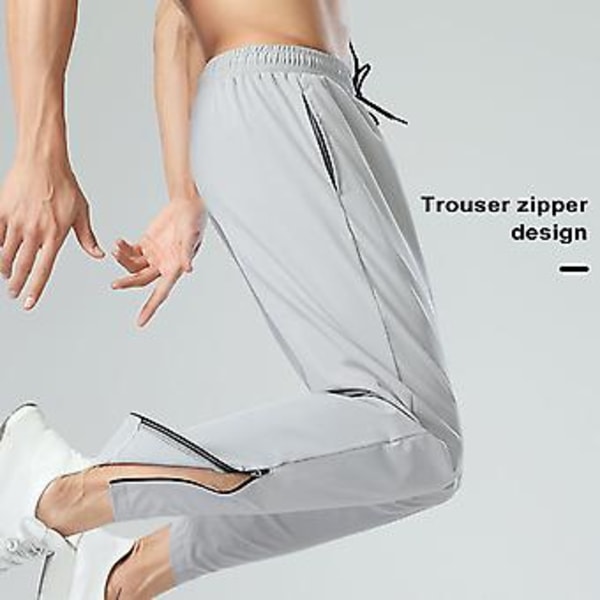 Män Sportbyxor Is Silke Snabbtorkande Enfärgad Elastisk Midja Mjuk Lösa Fickor Stretchbar Andningsbar Jogging Gym Långa Byxor (M Mörkgrå)