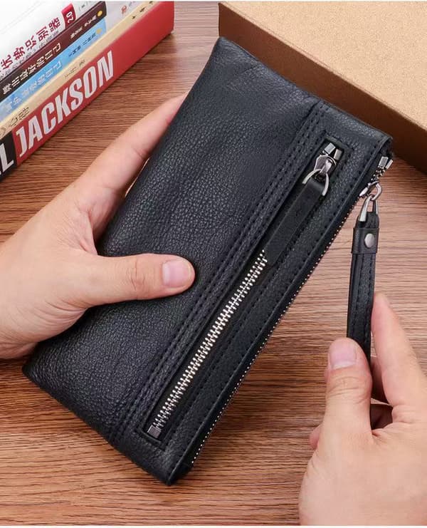Herre clutch i topnarvet læder