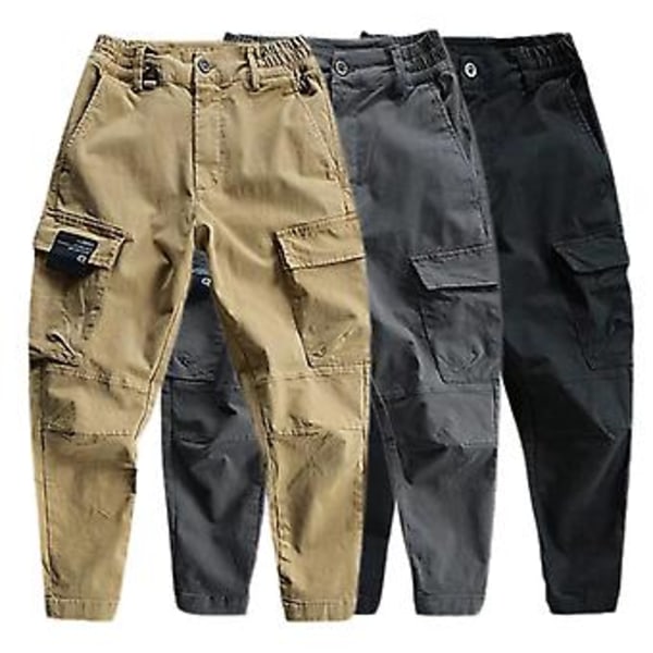 Elastisen vyötärön ja napillisen lentävän lahkeen nilkkapituudet miesten housut, monilla taskuilla, keski-istuvuus, miesten cargo-housut vuorikiipeilyyn (3XL Khaki)