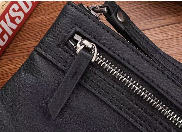 Herre clutch i topnarvet læder