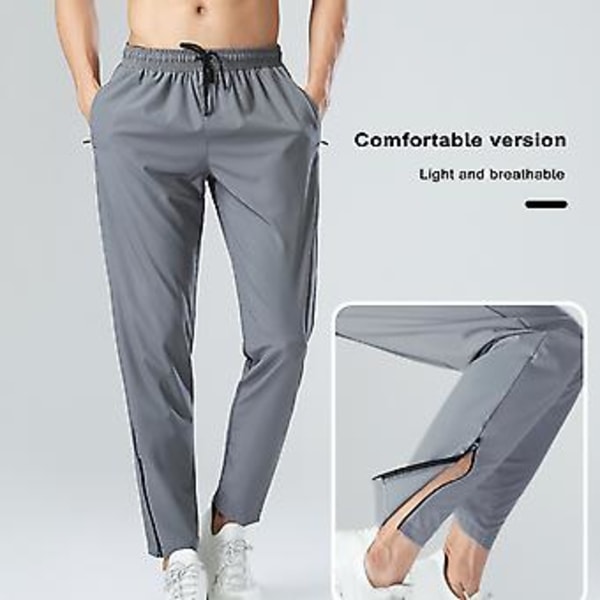 Miesten urheiluhousut Jääsiilkki Nopeasti Kuivuva Yksivärinen Joustava Vyötärö Pehmeä Löysä Taskut Joustava Hengittävä Jogging Kuntosali Pitkät Housut (2XL Tummanharmaa)