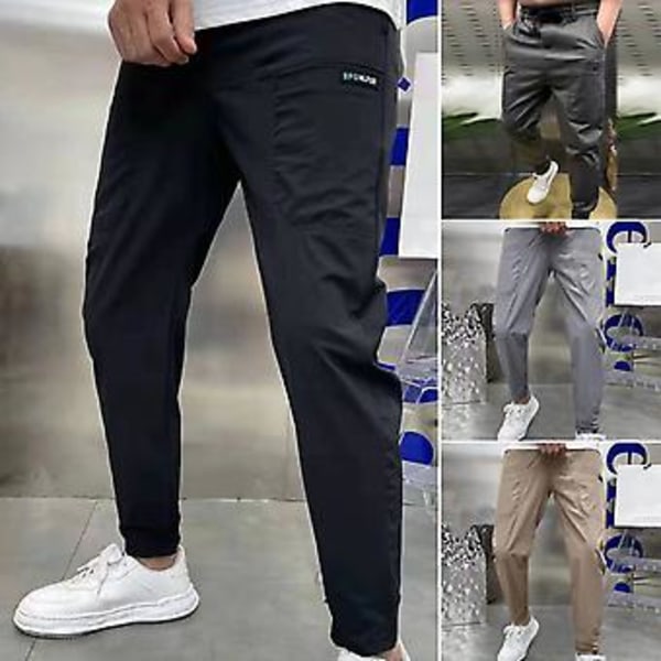 Män Byxor Elastisk Midja Flera Fickor Brev Broderi Ankel Längd Daglig Användning Solid Färg Slim Fit Is Silke Män Pencil Byxor Män Kläder (38 Grå)