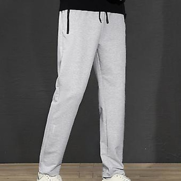 Män Vinterbyxor Mjuka Tjocka Elastisk Midja Enfärgad Lös Rak Byxor Med Snodd Fickor Casual Sportbyxor Män Höst Joggingbyxor (L Svart)