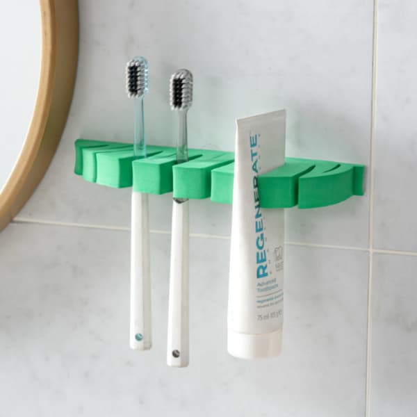 Pladsbesparende makeupbørsteholder Bladformet makeupbørste tørrestativ