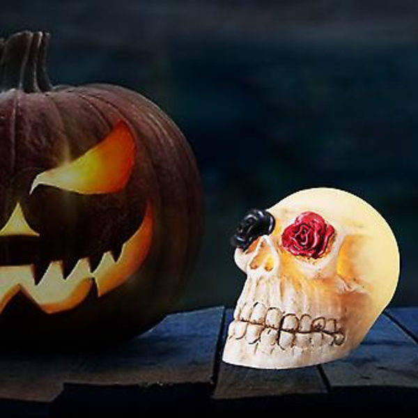 Halloween-hehkuvat kallovalot - Hartsikallopats ruusujen kanssa Halloween-kauhu (suu kukilla)