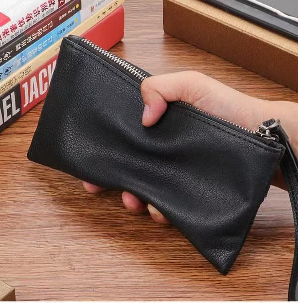 Herre clutch i topnarvet læder