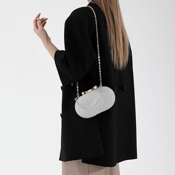 Oval Glitter Aftenclutch med Topphåndtak og Kjedestropp, Gull