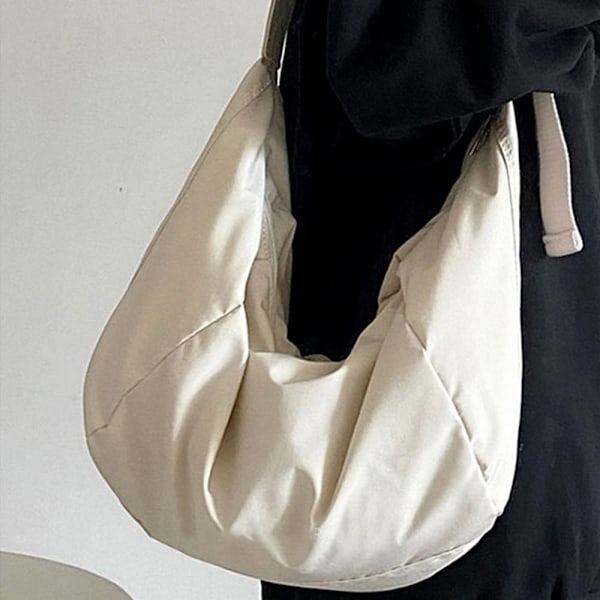 Valkoinen crossbody dumpling -laukku - WELLNGS white 0