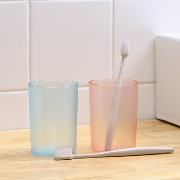 Läpinäkyvä juoma lasten sininen vaaleanpunainen hammasharjakuppi Creative Water Cup aikuisten hammasharja