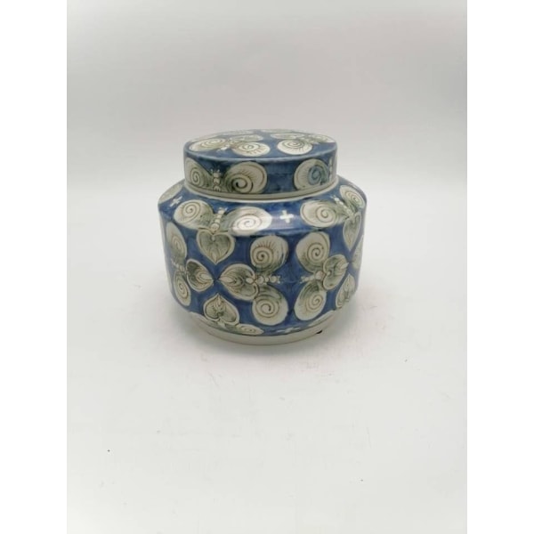 Original porcelain jar with a lid in a hand-painted pattern