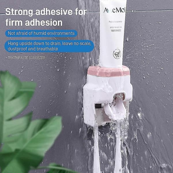 Automatisk tandpastadispenser og tandbørsteholder (pink)