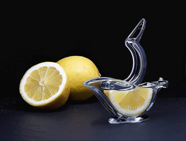 Set med 2 individuellt designade citronpressar, liten transparent fruktpress
