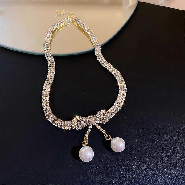 Perle- og diamantbue sjarm anheng vakkert halskjede