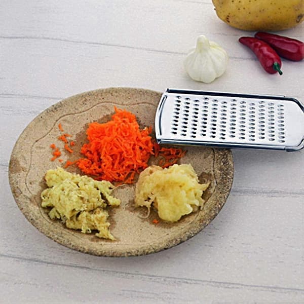 Liten Rivjernskive i Rustfritt Stål Zester Parmesan Rivjern Sitron Rivjern Silikonhåndtak 1 stk