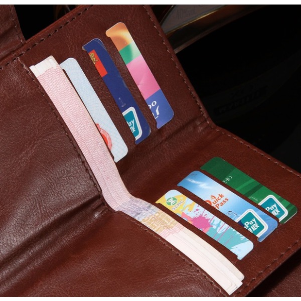 Praktisk läderplånbok med Mobilfack UNIVERSAL (upp till 5,5'') Lila