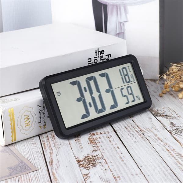 Digital väckarklocka, svart LCD med temperatur- och luftfuktighetsdisplay, väggmonterbar