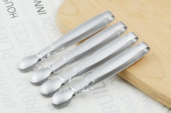 Sett med 4 mini serveringstenger i rustfritt stål, 10 cm