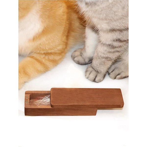 Samlarobjekt för kattens morrhår, magnet för minnessaker, valnötslåda.