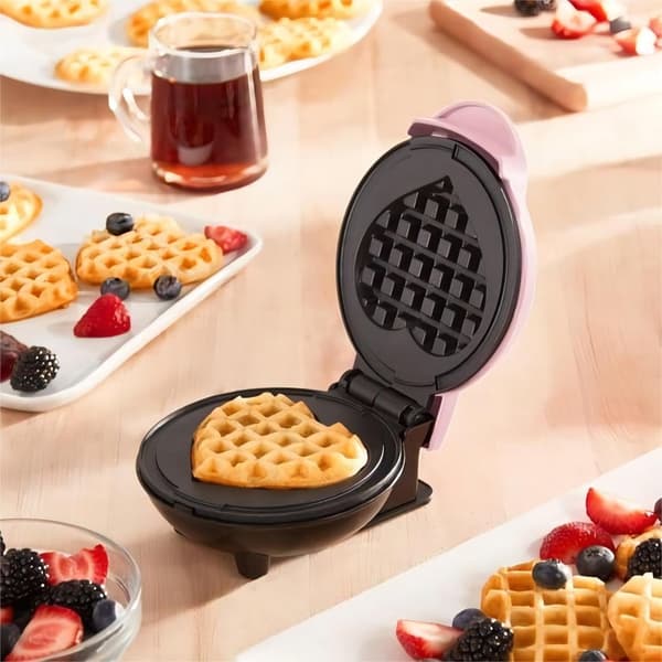 Våffeljärn med non-stick beläggning, våffelfyllning, justerbar bryningskontroll, hjärtform, rosa.