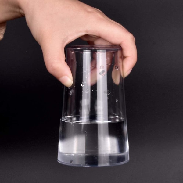 Hydrostatisk glas hængende vand i koppen Magiske tricks med instruktionsstadie Nærbillede Gimmick-rekvisitter Komedie Væske forbliver i glas Magi