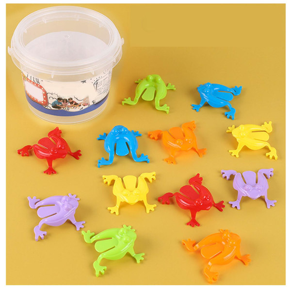 12st Färgglada groda hoppa leksaker Fingerpressande hoppande grodor med hink Barn studsande set Presentask Packinghink