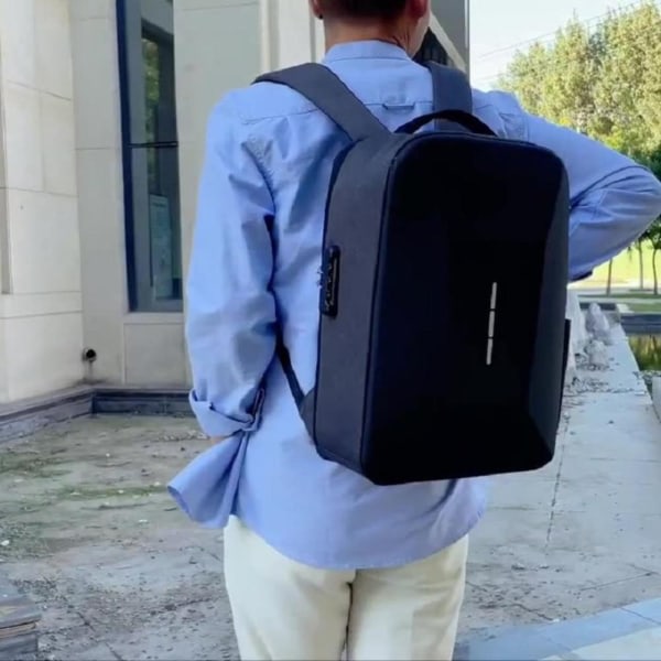 Casual ryggsäck för män med USB-laddningsport Stöldskyddande hårt skal bärbar datorväska för utomhusresor Svart