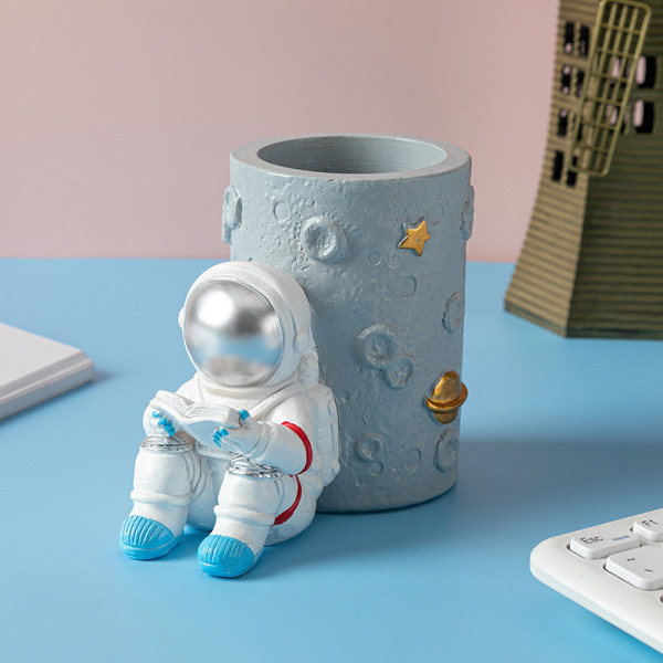 Dekorativ skrivebordsskrivesaker Astronaut penneholder