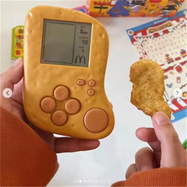 För barn Mcdonalds Mcnuggets Tetris handhållen spelkonsol med batteriklistermärken