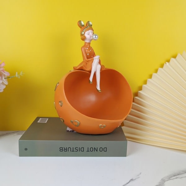 Nøkkeloppbevaringsskål Bubble Blowing Girl Resin Statyer for Home Office Orange Girl Forvaring