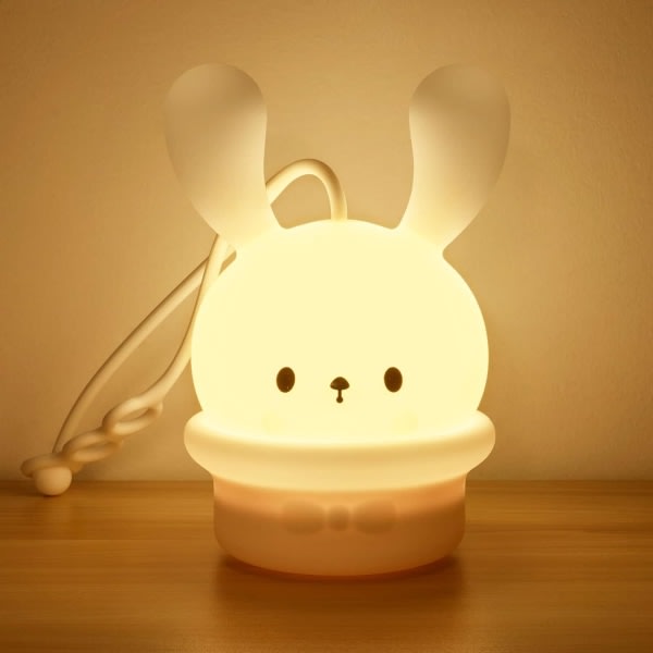 Søt kanin baby nattlampa barnlampa, 9 fargeskiftende LED-bærbare djursilikonlamper, USB-oppladingsbar nattlampa for barns soverom